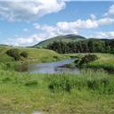 The Bowmont Water with Yeavering Bell.